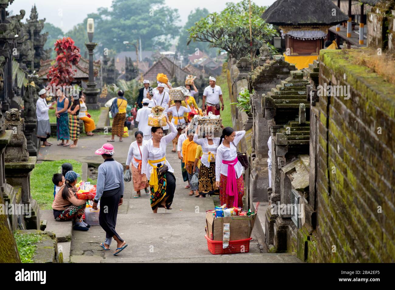 Besakih, Bali, Indonesia - November 24, 2018: Indonesian people at Pura Besakih, or Mother Temple, Balinese largest hinduis temple and most famous tou Stock Photo