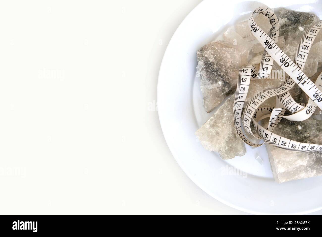 on a white background mineral source rock salt components Stock Photo