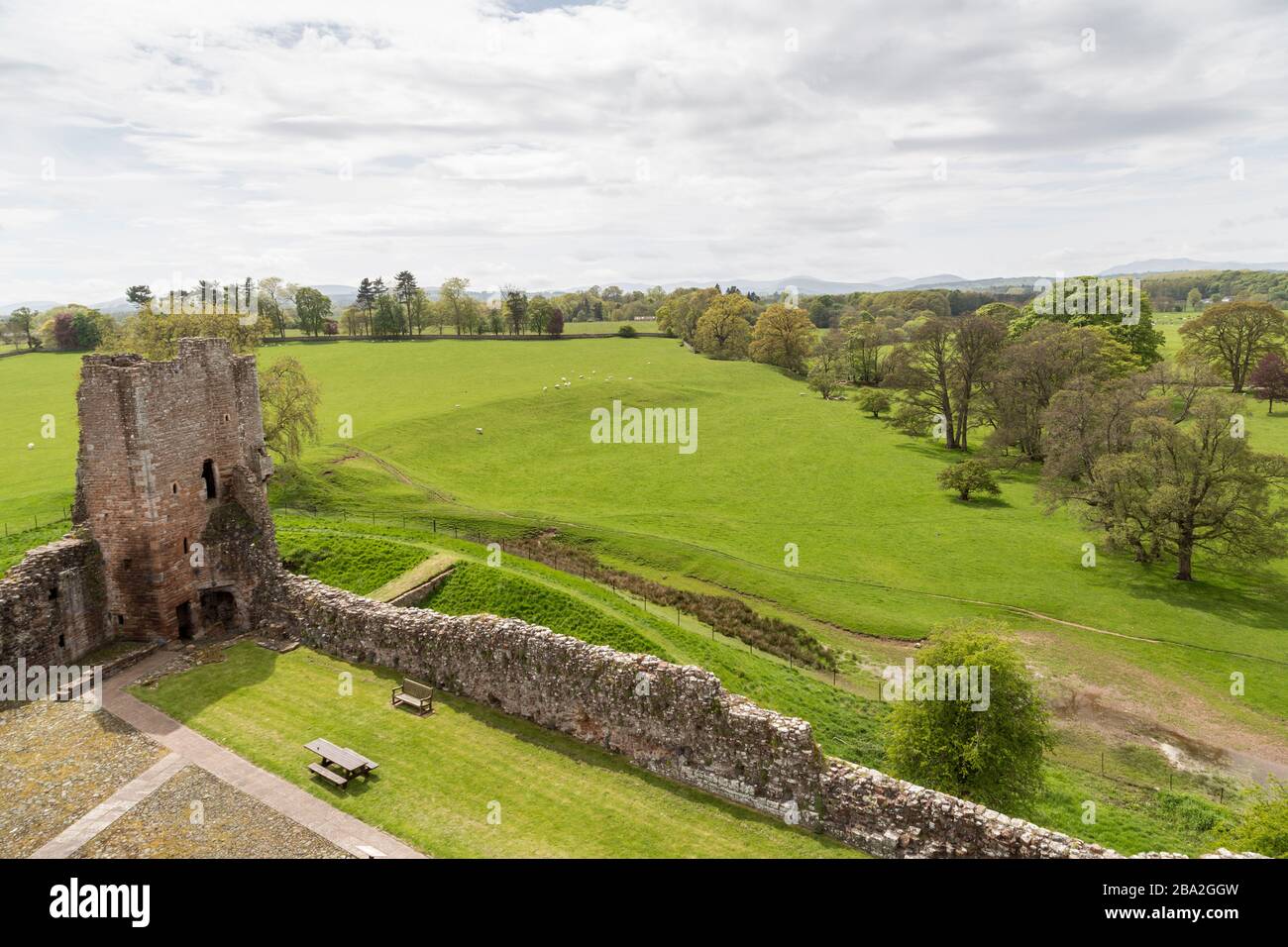 The Tower of League built c. 1300 and countryside beyond, Brougham Castle ruin, Cumbria, England, UK Stock Photo