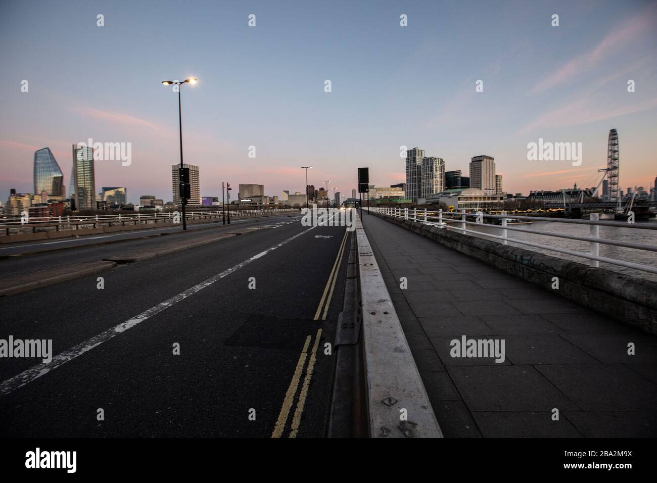 A totally quiet Waterloo Bridge at twilight in the heart of Central London during the Covid-19 Lockdown as economiists predict a crash could cost more life than Cronavirus. 25th March 2020, London, England, United Kingom Credit: Jeff Gilbert/Alamy Live News Stock Photo