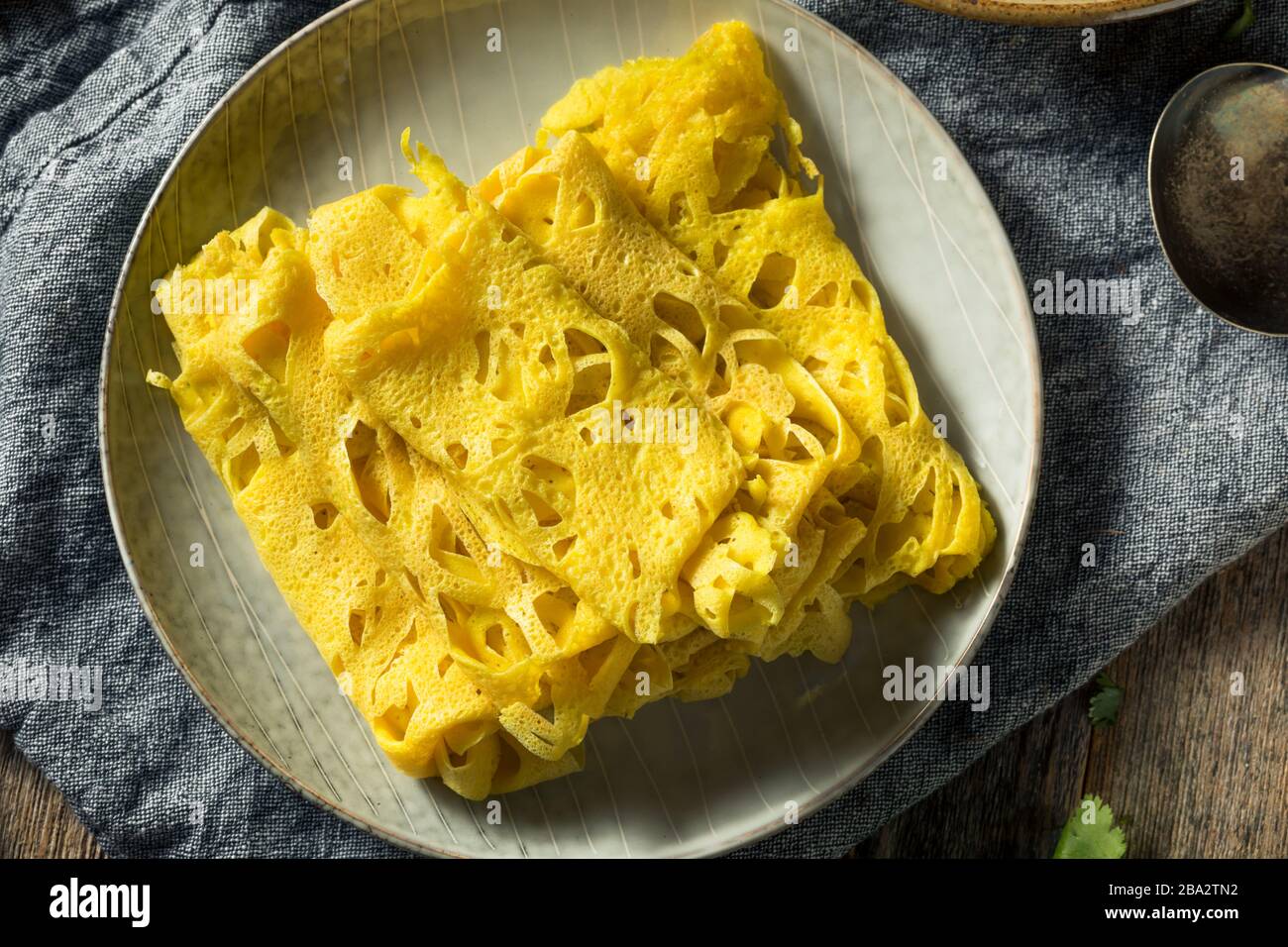 Homemade Malaysian Net Crepe Roti Jala Ready to Eat Stock Photo