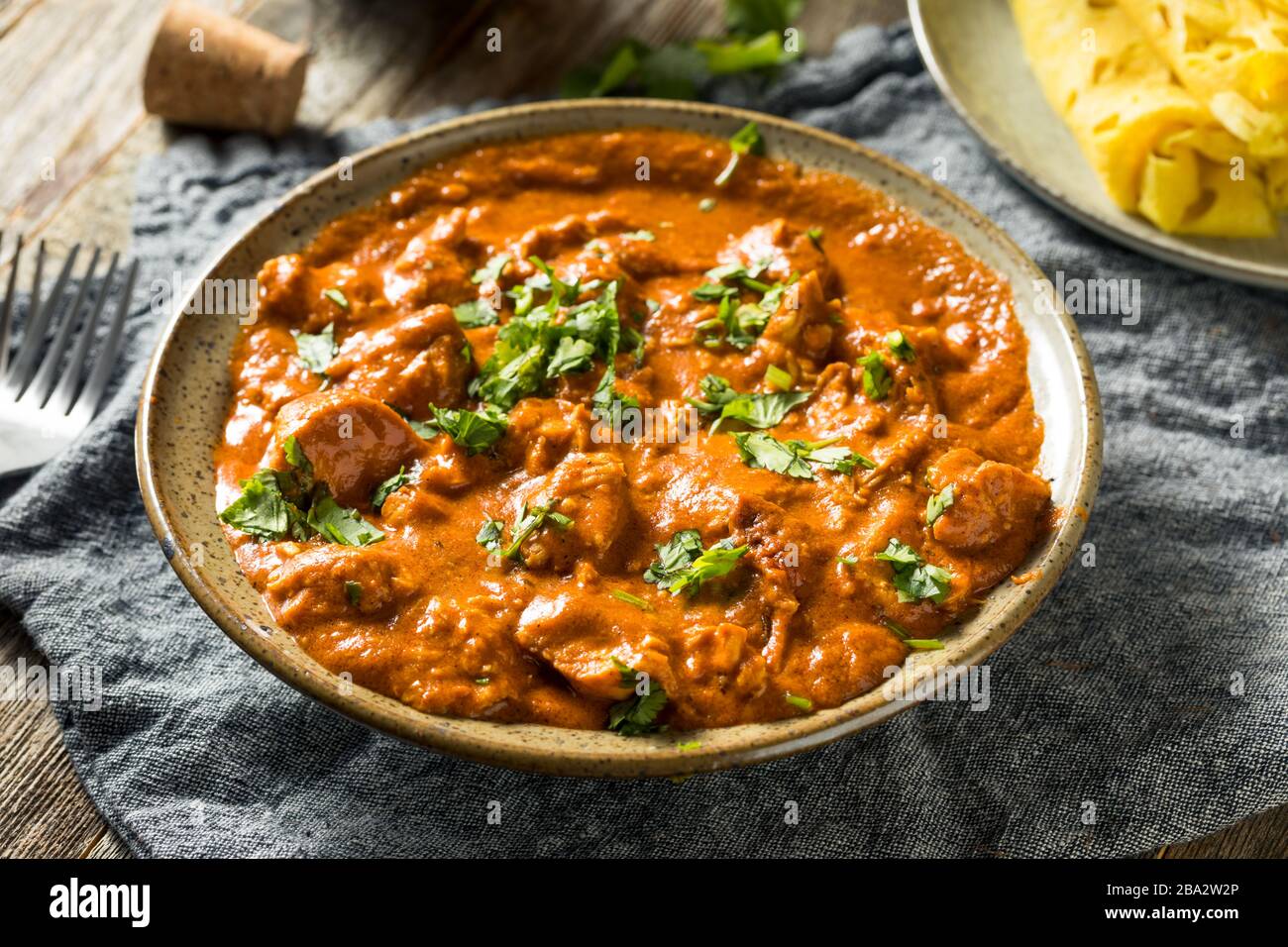 Homemade Chicken Tikka Masala with Cilantro and Sauce Stock Photo