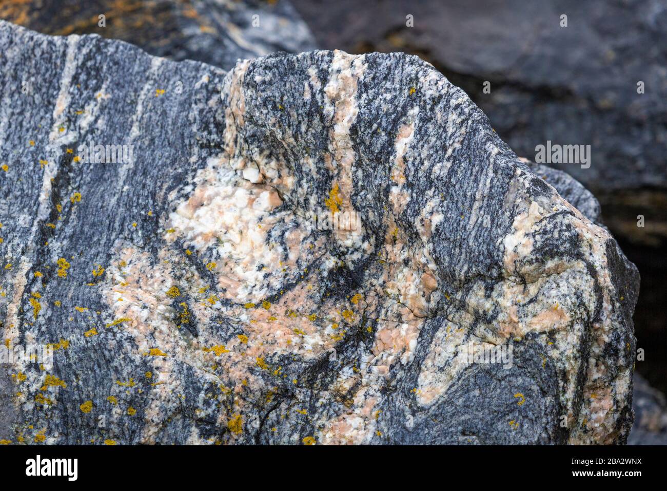 Close shots of parts of stones at the harbour of Alesund at the Norwegian Sea Stock Photo