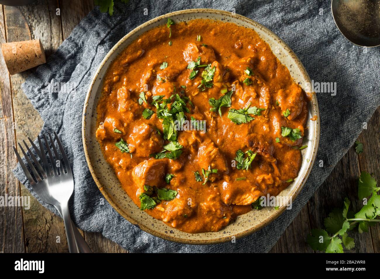 Homemade Chicken Tikka Masala with Cilantro and Sauce Stock Photo