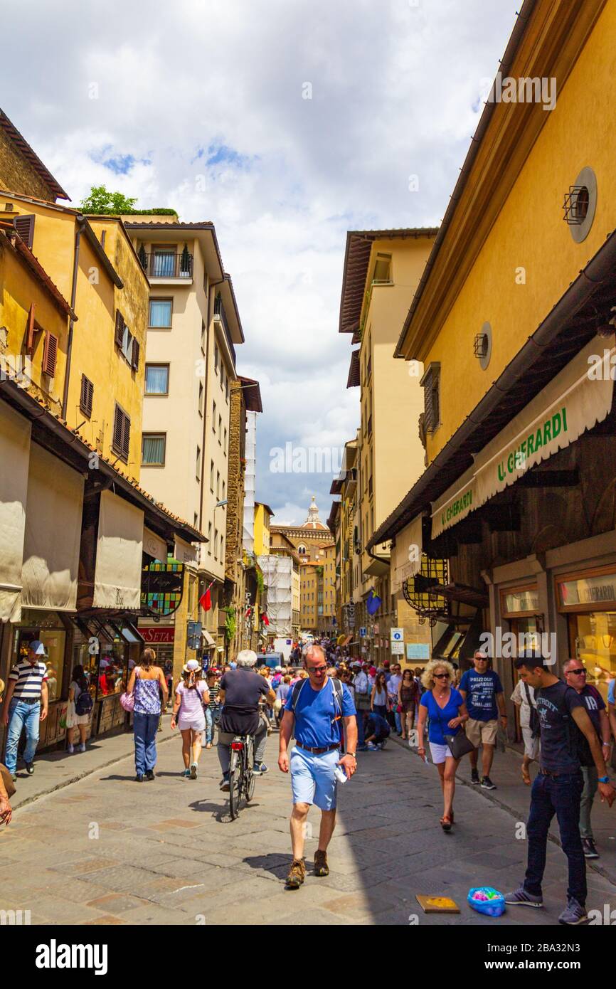 Crowded Ponte Vecchio- medieval stone closed-spandrel segmental arch