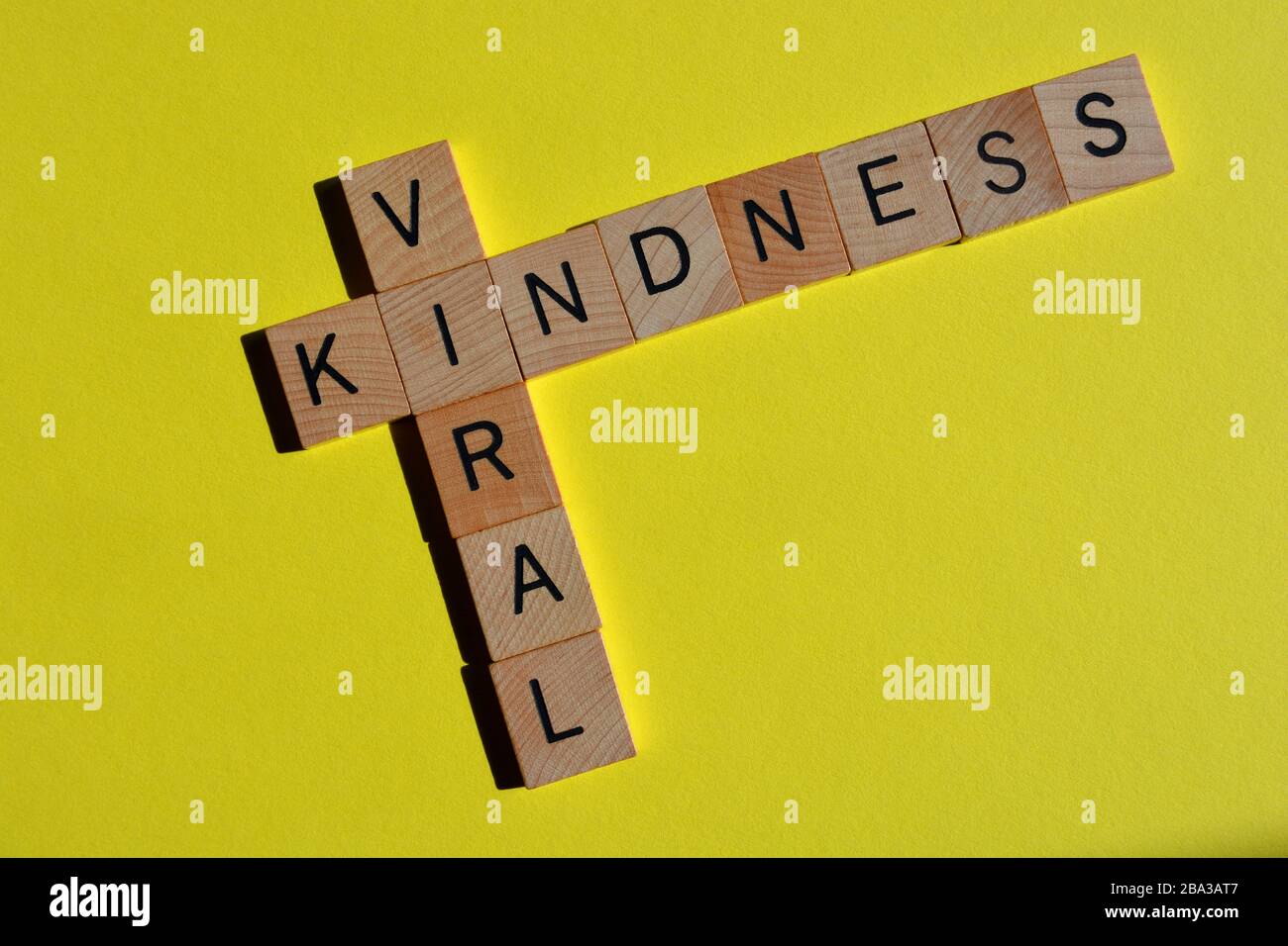 Viral Kindness, words on pink with copy space Stock Photo