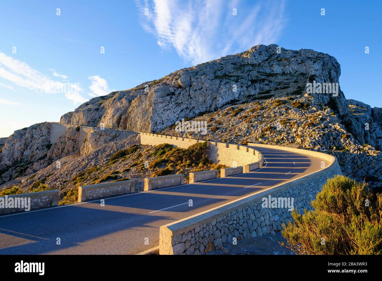 Mountain road at Cap Formentor in the morning light, near Pollenca, Majorca, Balearic Islands, Spain Stock Photo