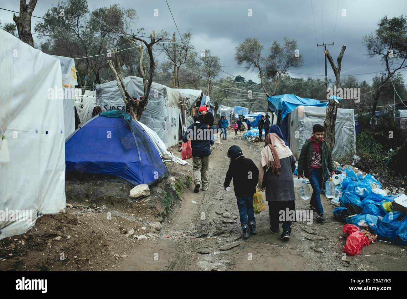 Refugees in front of the first station of the camp MORIA CAMP for