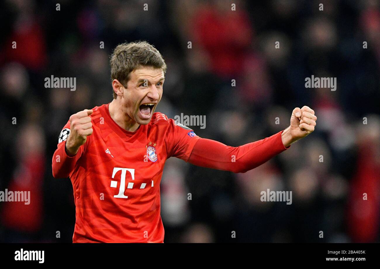 Goal celebration, Thomas Mueller, FC Bayern Munich, in Champions League jersey, Allianz Arena, Munich, Bavaria, Germany Stock Photo