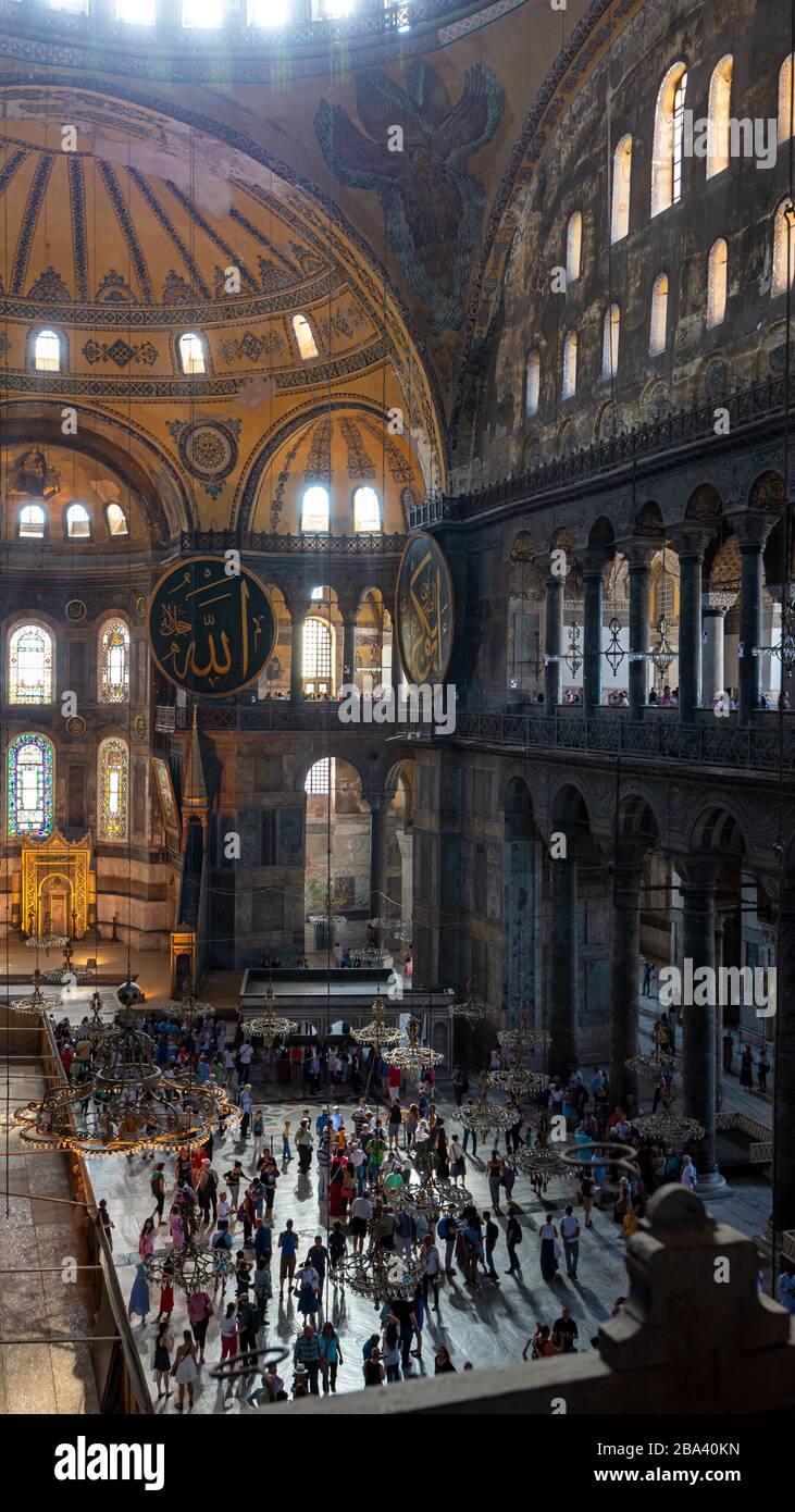 Crowds of people inside the Hagia Sophia, portrait format, Istanbul, Turkey Stock Photo