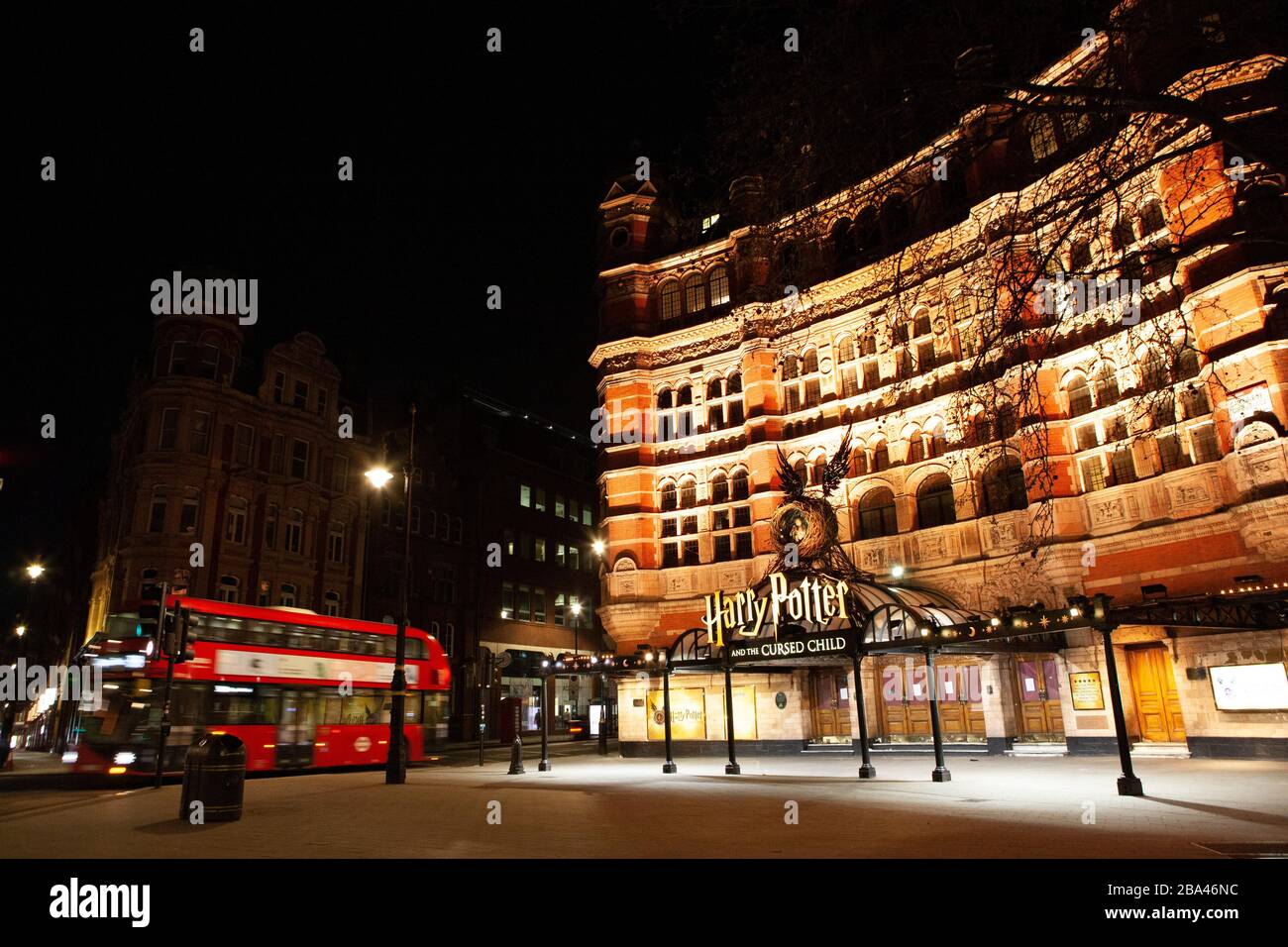 London, UK: thelights are on but no-one is home. The West End is deserted in the evening during the covid-19 lockdown. Although the Cambridge Theatre is illuminated with signs for Harry Potter and the Cursed Child, the show is not running and nearby pubs and restaurants are all closed too. Anna Watson/Alamy Live News Stock Photo