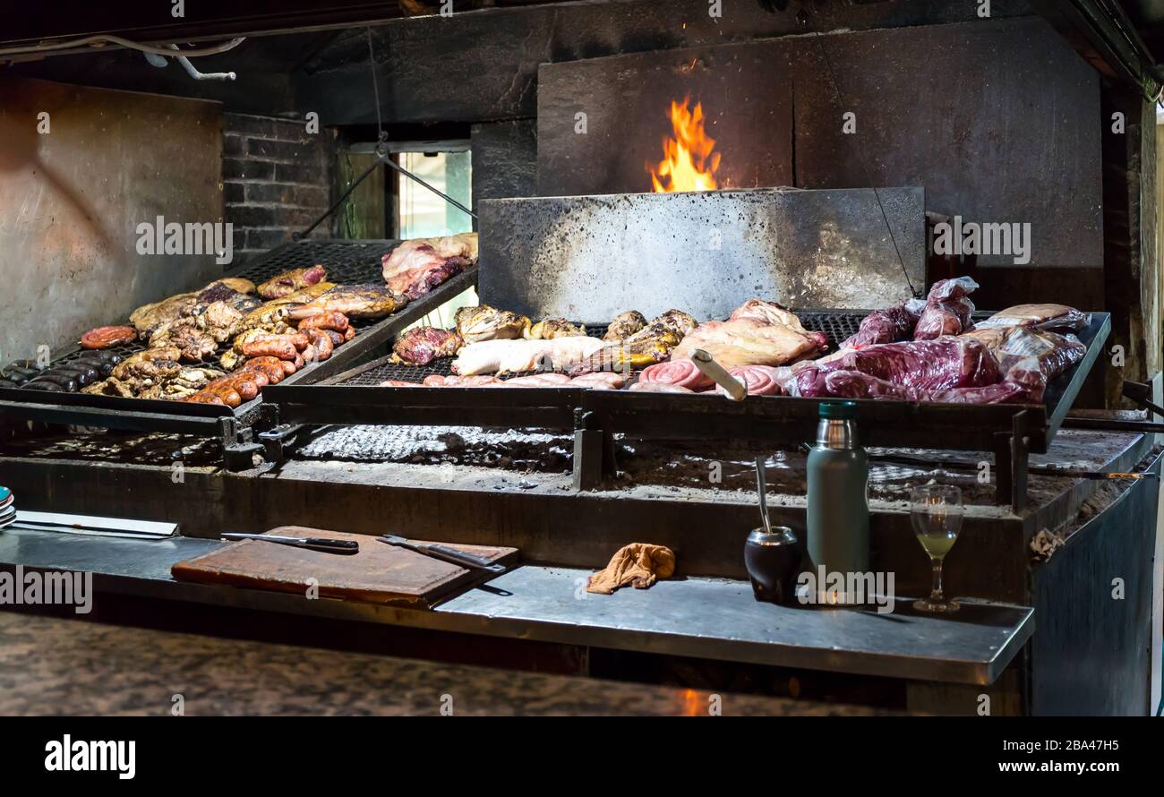 A restaurant in Montevideo Uruguay cooks meat on a fire Photo Alamy