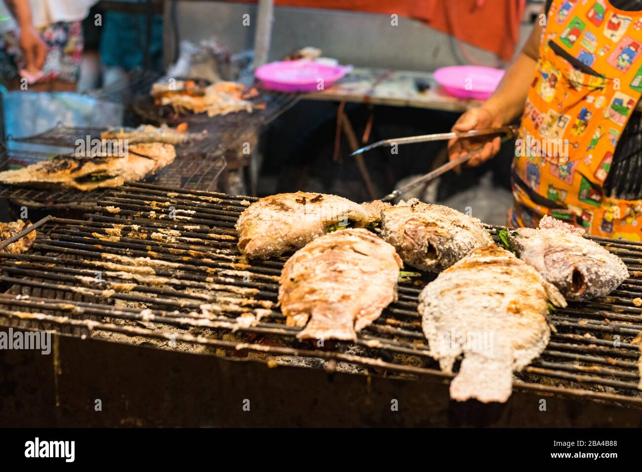 Grilled fish Street food in a thailand market Stock Photo - Alamy