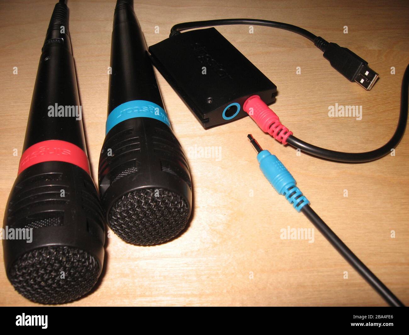 Deutsch: Singstar-Mikrofone und USB-Konverter; 10 April 2008; Own work;  Zoidy at de.wikipedia Stock Photo - Alamy