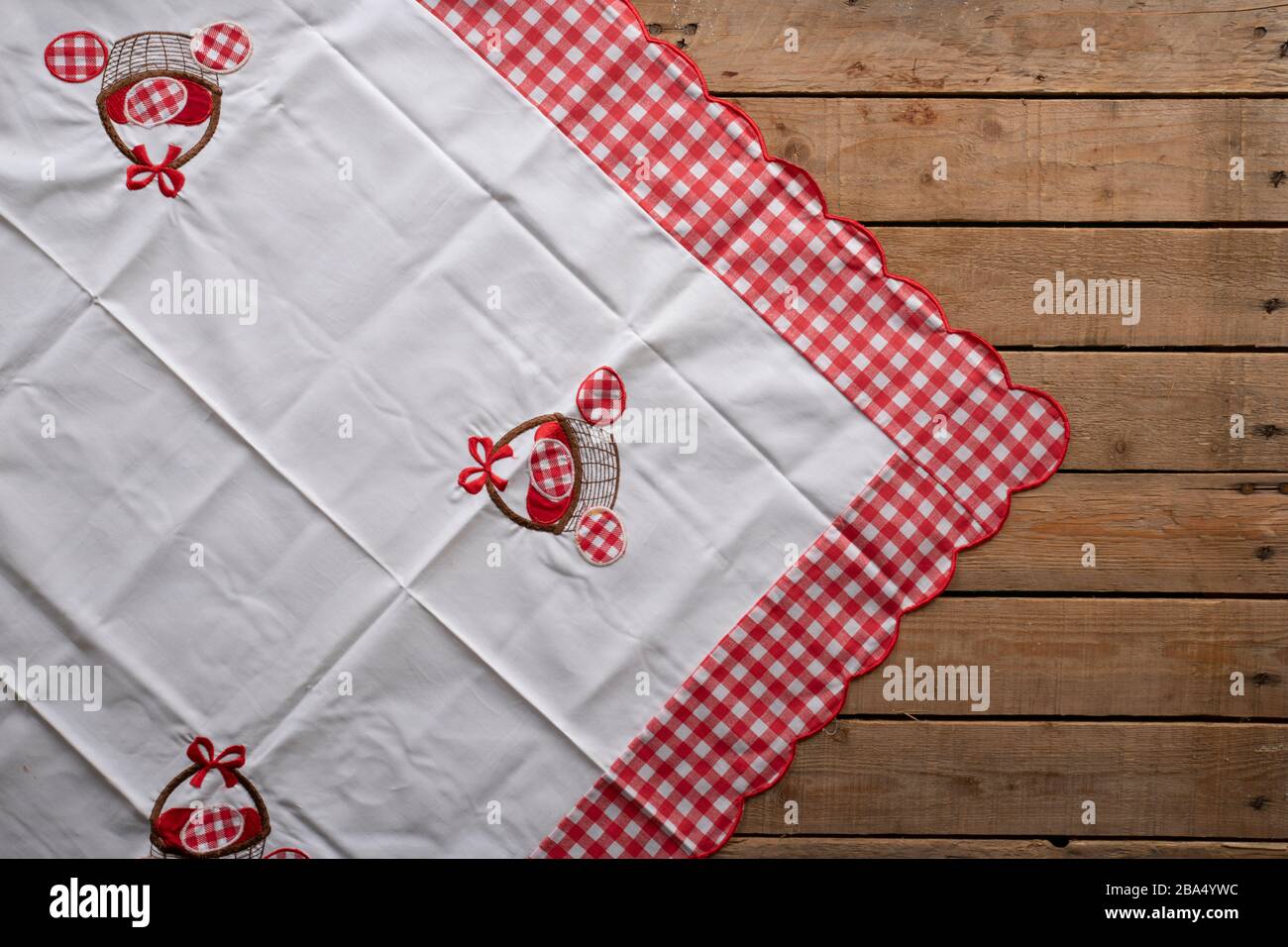 Easter tablecloth on an old rustic wooden table Stock Photo
