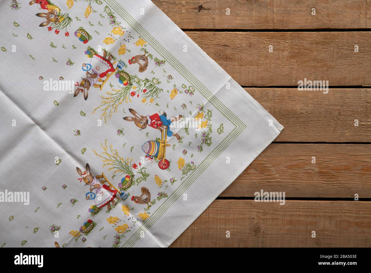 Easter tablecloth on a wooden old rustic table Stock Photo
