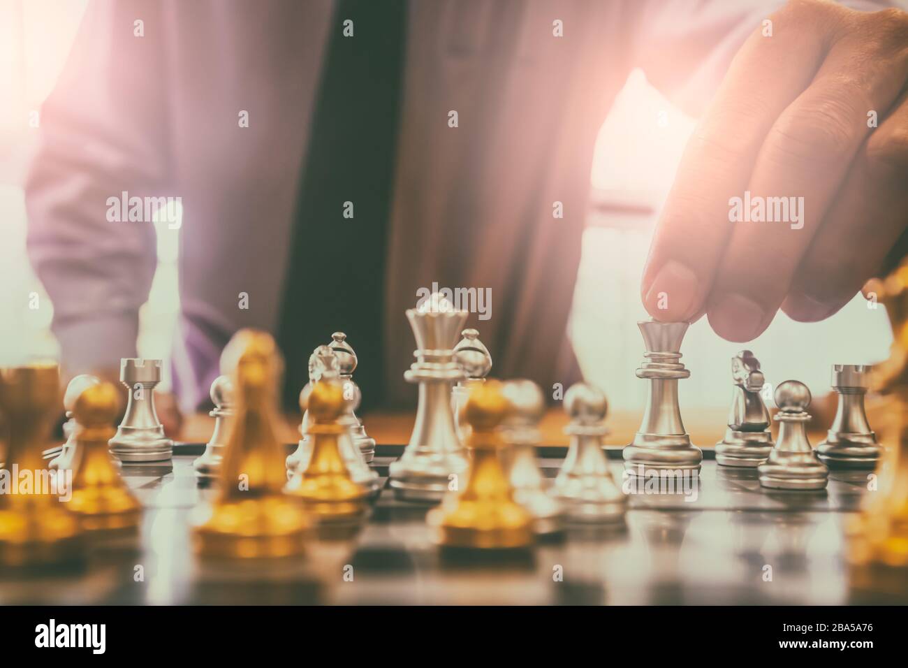 Man playing chess. Play with God or with yourself. Concept - strategy  goals, efforts, plans. Stock Photo