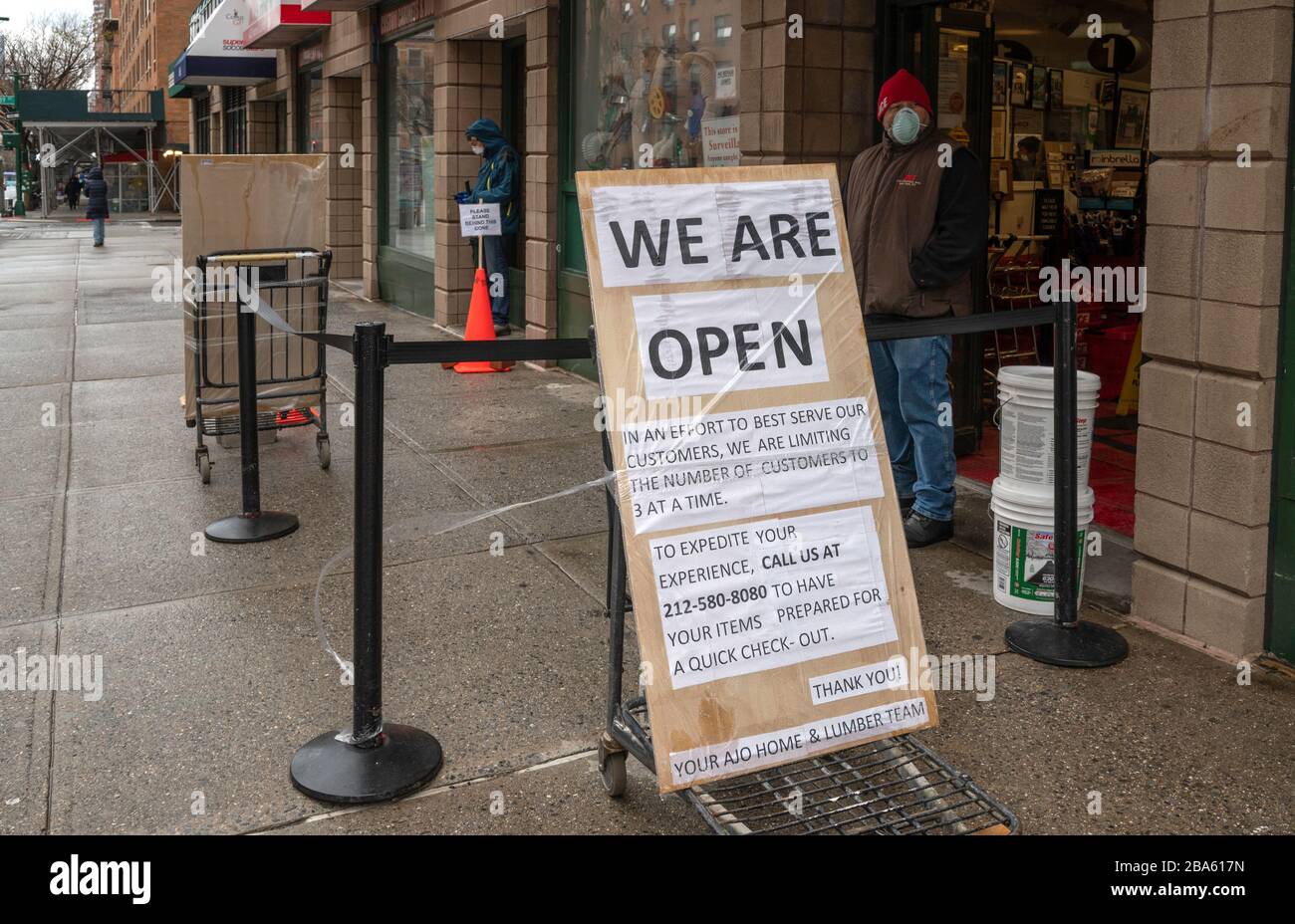 NEW YORK, NY - MARCH 25, 2020. Sign outside an ACE Hardware store on the Upper West Side of Manhattan in New York City during the coronavirus outbreak in New York City. The World Health Organization declared coronavirus (COVID-19) a global pandemic on March 11th. Stock Photo