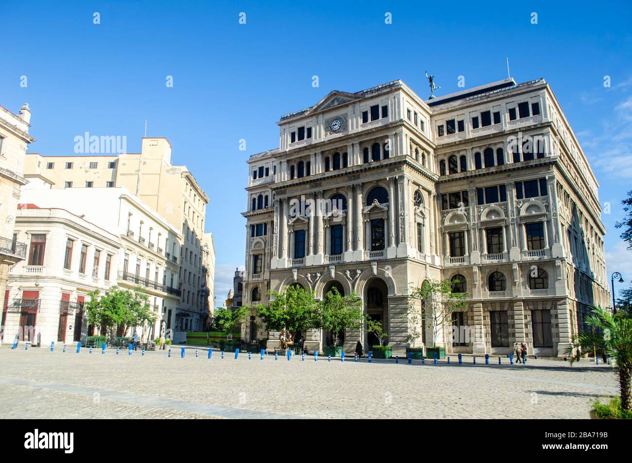 Buildings around the San Francisco de Asís Square in the Old Havana.   The 'Lonja del Comercio' building is seen on the right Stock Photo