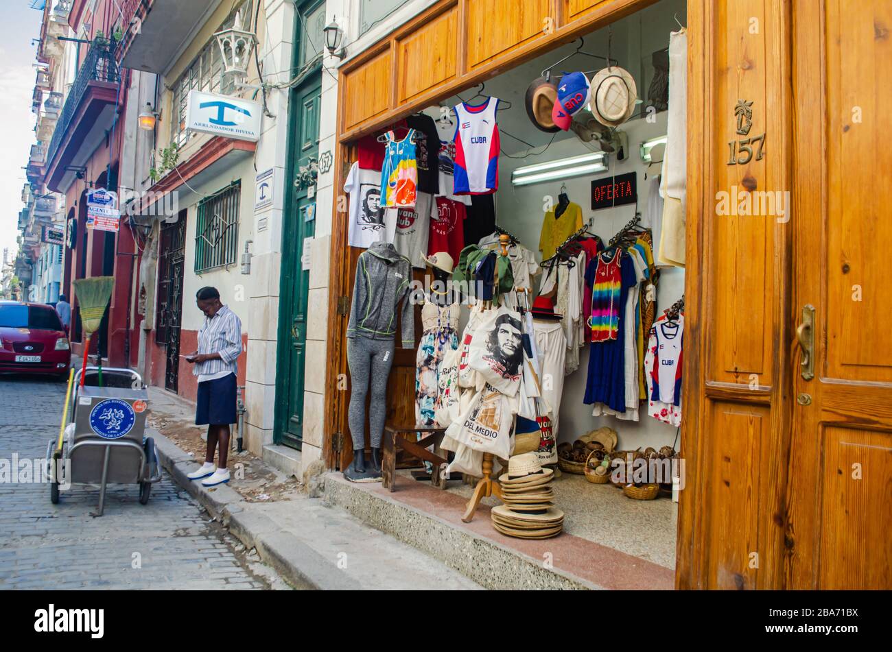 Scene of daily life in the Old Havana. A souvenir store is seen on the right Stock Photo