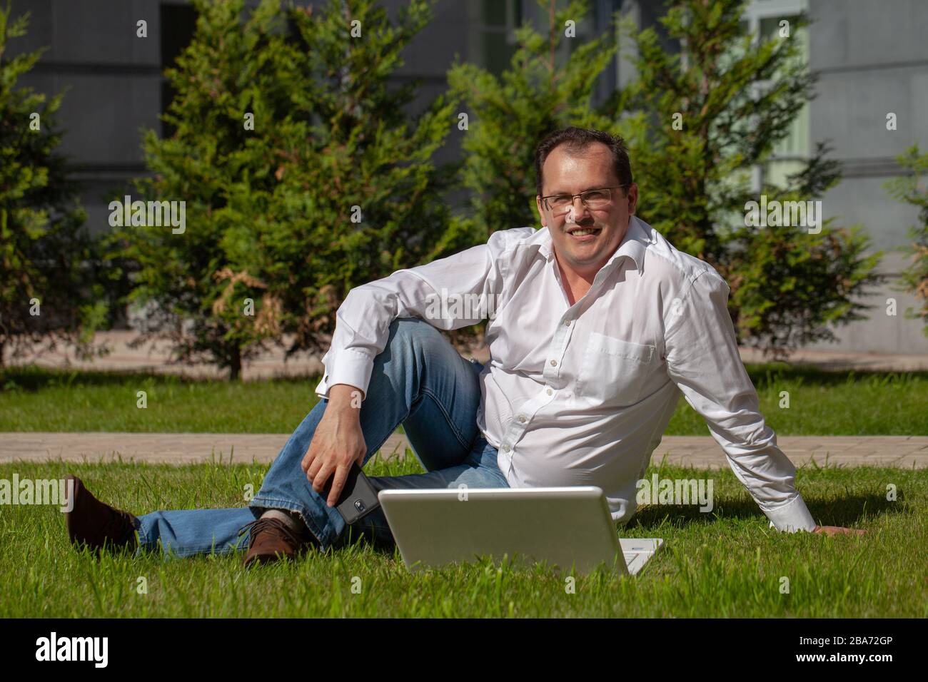 Male freelancer holding wireless hi-res stock photography and images ...
