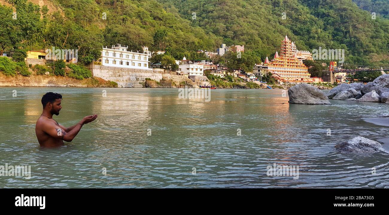 Holy bath in the holy river ganges, Rishikesh, Uttrakhand, India Stock Photo