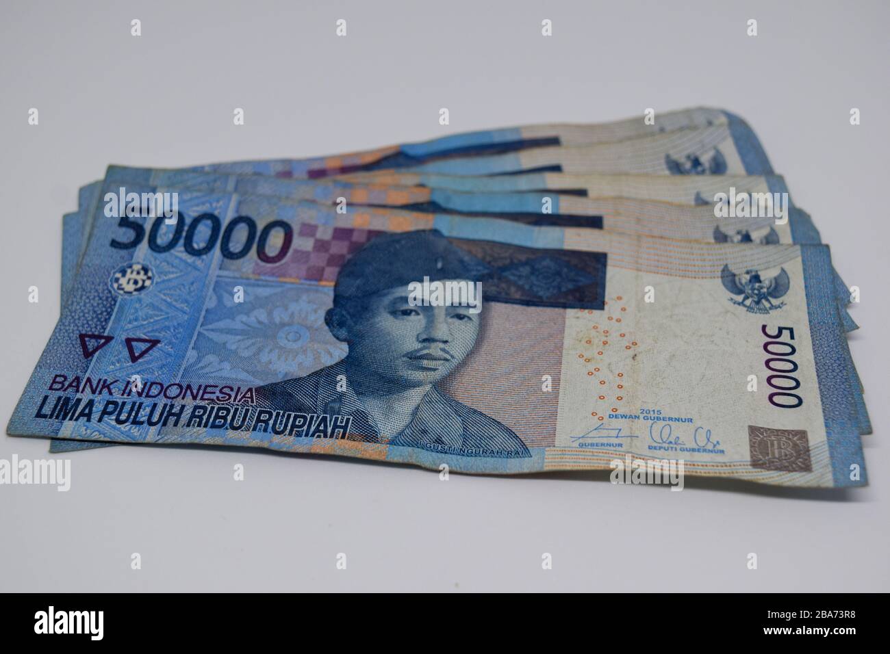 Close up fifty thousand Indonesian Rupiah isolated on White Background ...