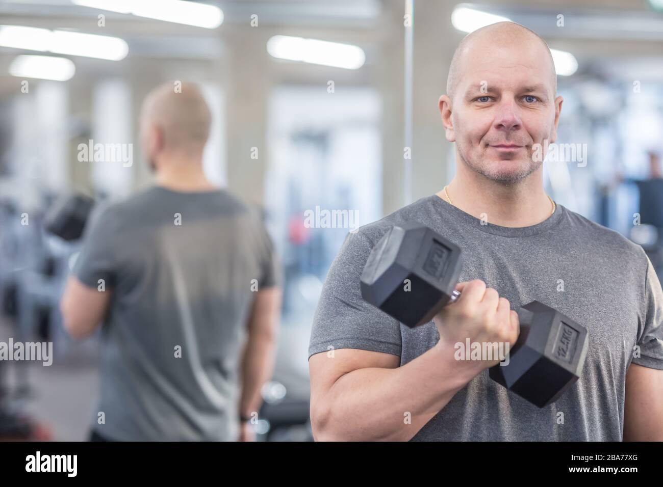 Handsome muscular fit young man hi-res stock photography and images - Alamy