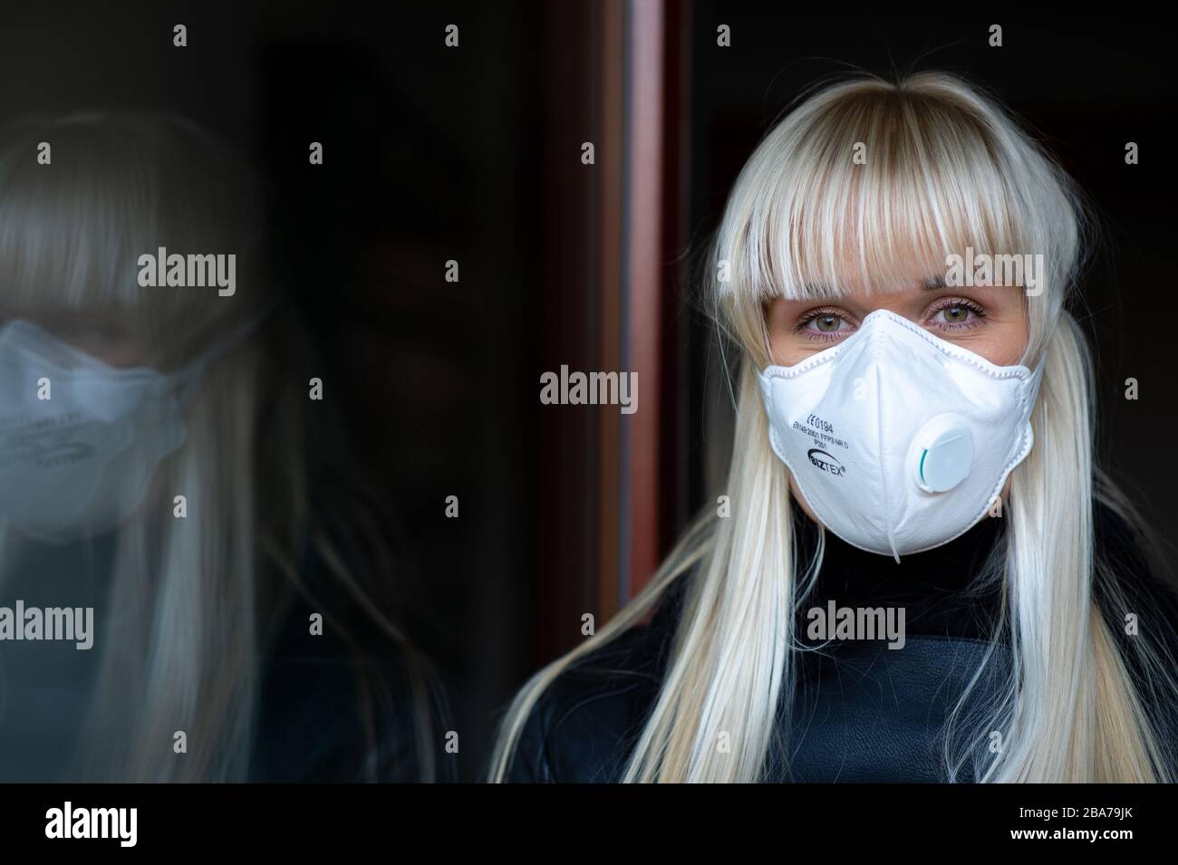 Blonde woman with with FFP3 respirator is seen in Prague, Czech Republic,  on March 25, 2020. (CTK Photo/Martin Kabat Stock Photo - Alamy