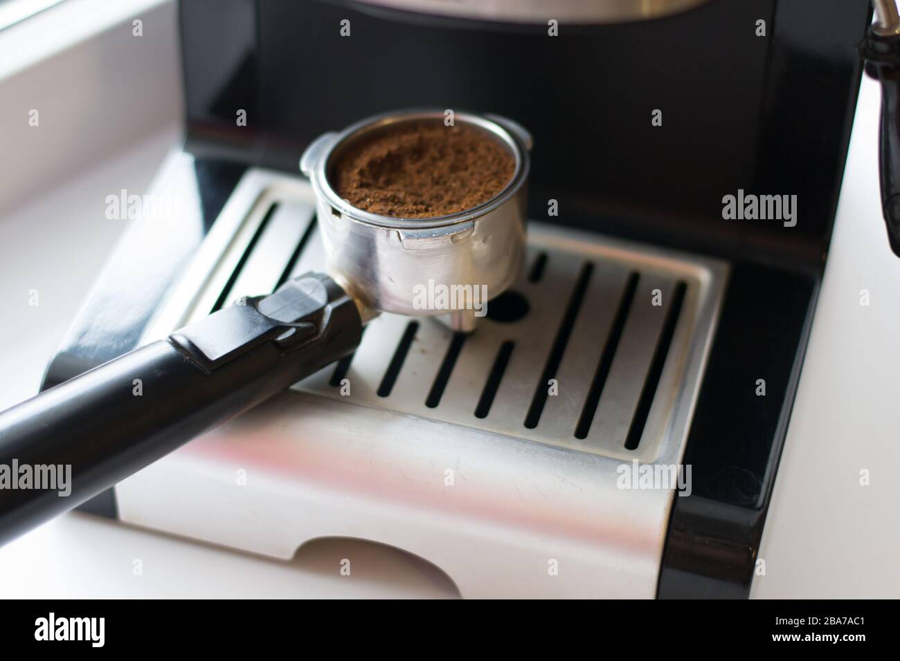 Make fresh coffee in a coffee machine Stock Photo Alamy
