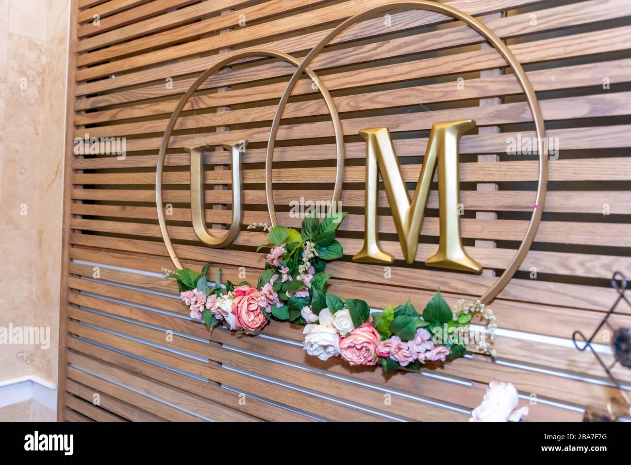 Beautiful wall decoration for a wedding with the letters U and M Stock