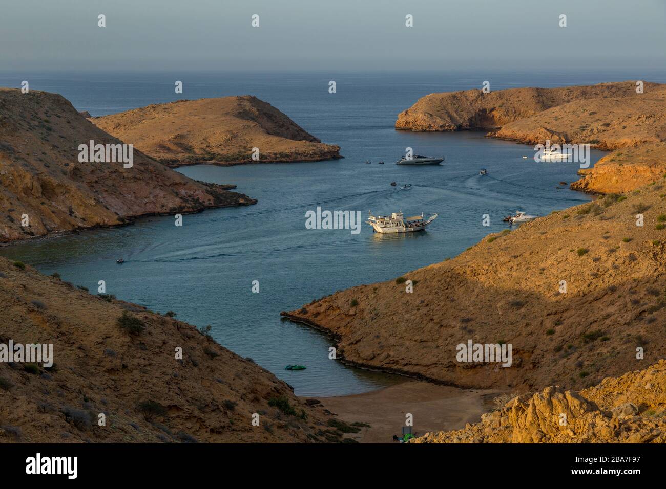 A bay at Bander Al Khayran, or Bander Al Khairan, just east of Muscat in Oman. Pleasure boats can be seen in the bay. Stock Photo