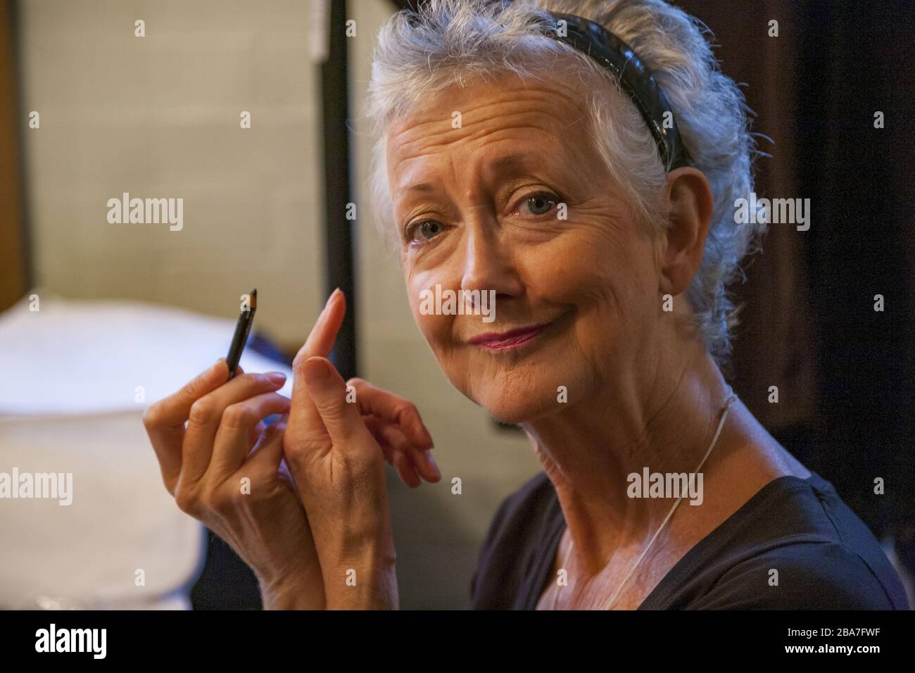 LONDON, UNITED KINGDOM - Sep 13, 2013: Susan Sheridan makes up as Trillian for The Hitchhiker's Guide to the Galaxy Radio Show Live Stock Photo