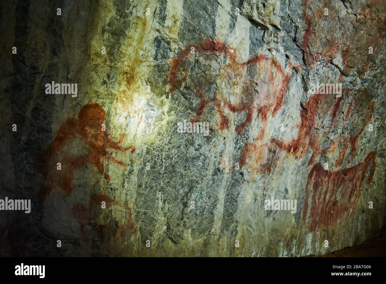 Rock paintings in a stone cave of an ancient prehistoric Neanderthal man. Mammoth. stone Age. Ice Age. Shulgan Tash Cave Russia Bashkiria Stock Photo