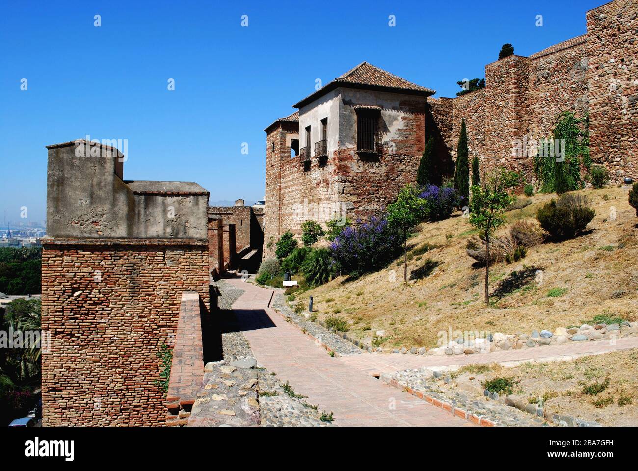 Upper walled precinct of the citadel viewed from the South at Malaga castle, Malaga, Malaga Province, Andalucia, Spain. Stock Photo