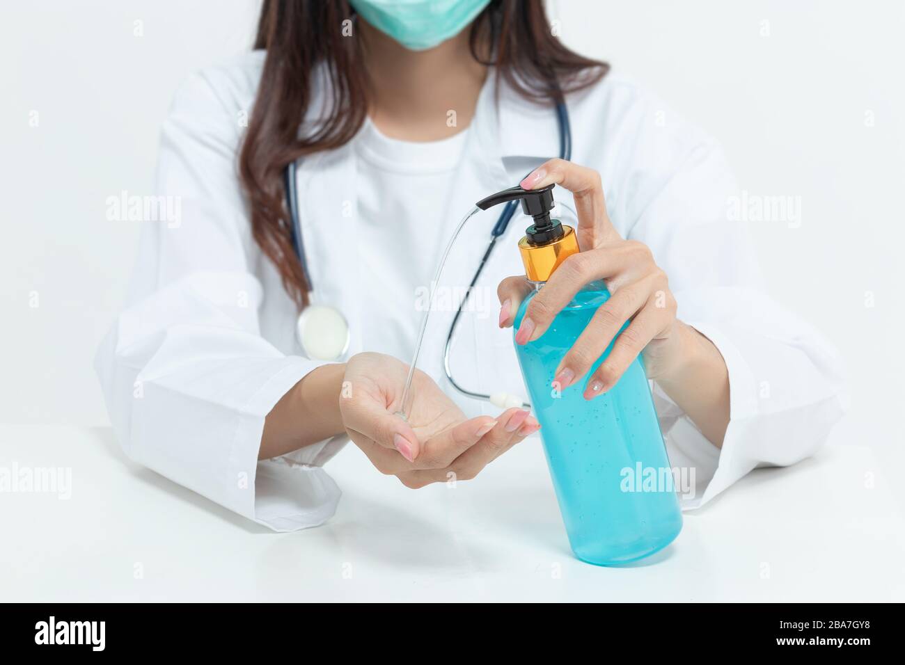 doctor and medical staff washing hand by hand sanitizer alcohol gel for cleaning, hygiene and disinfection, prevent of spreading of germs during infec Stock Photo