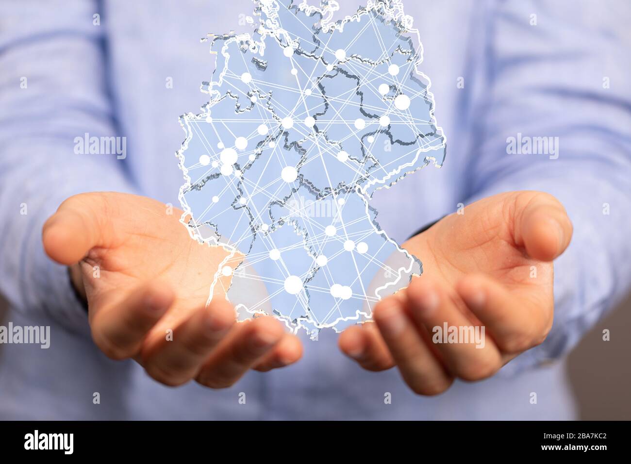 A germany map digital in hand 3d Stock Photo - Alamy
