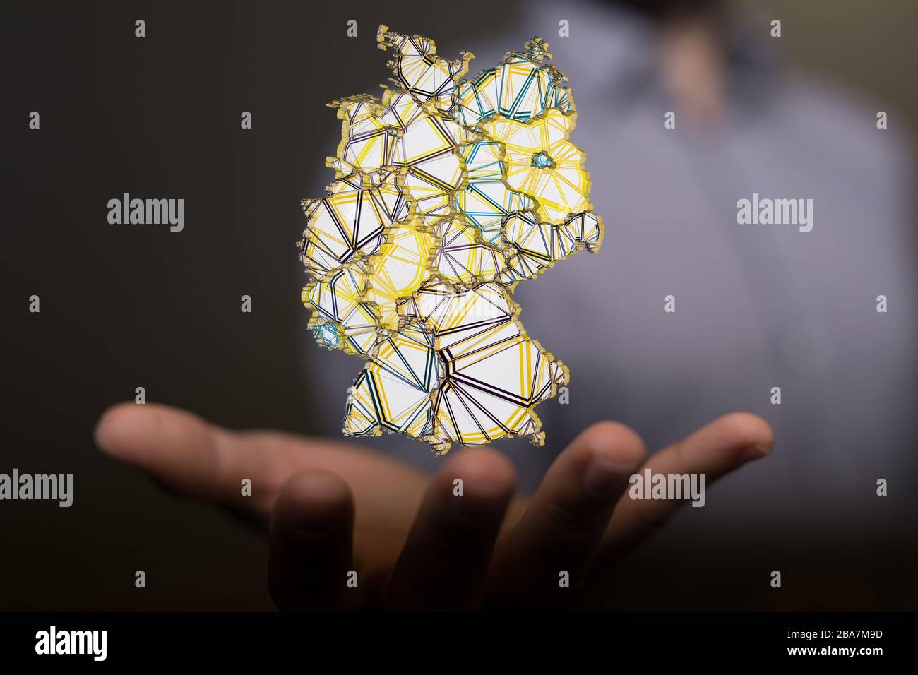 A germany map digital in hand 3d Stock Photo - Alamy