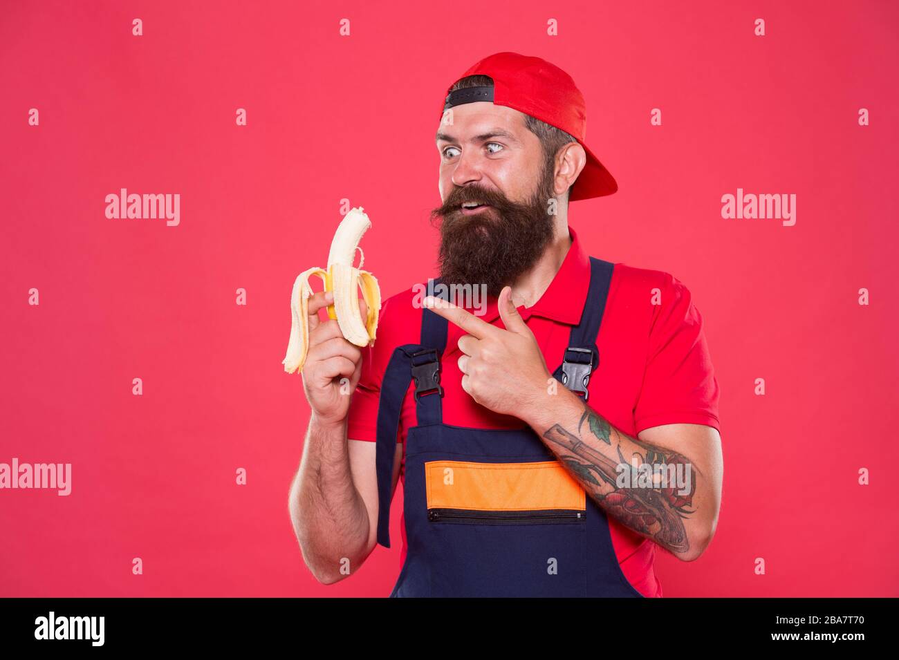 Hungry hipster. Fresh fruit. Living healthy life. Tasty food. Bite