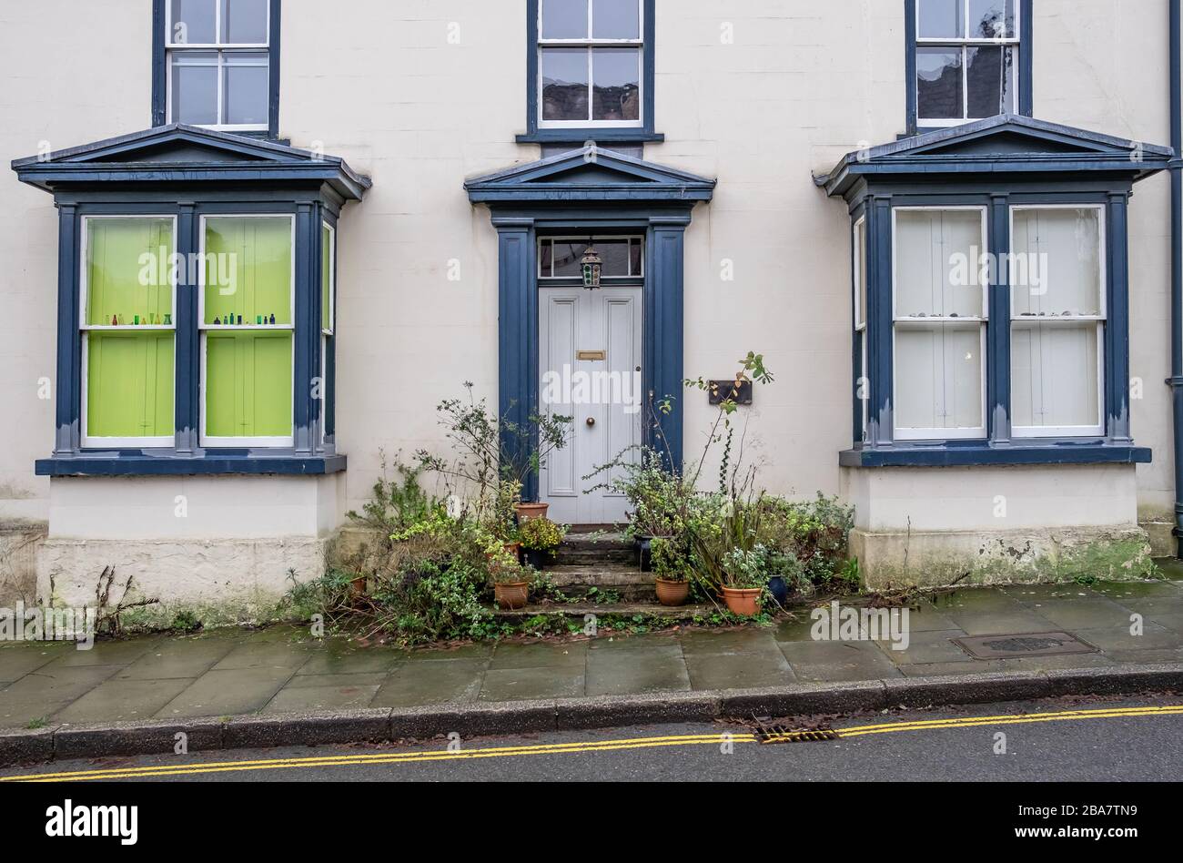 Symmetrical house front with bay windows and sash windows Stock Photo