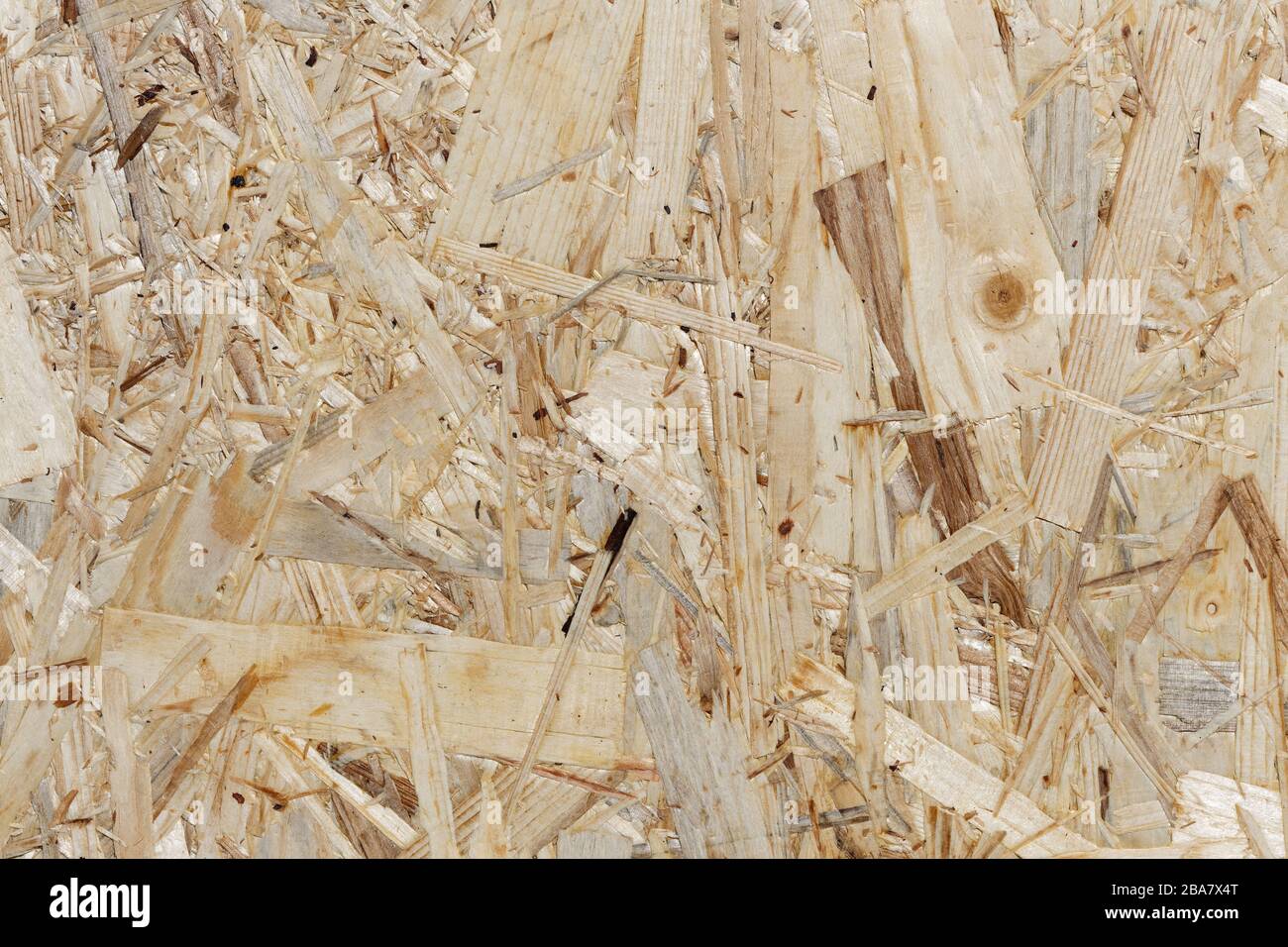 Wood Texture - OSB-Board Background: section of an oriented strand board, made of different kinds of softwood strands Stock Photo