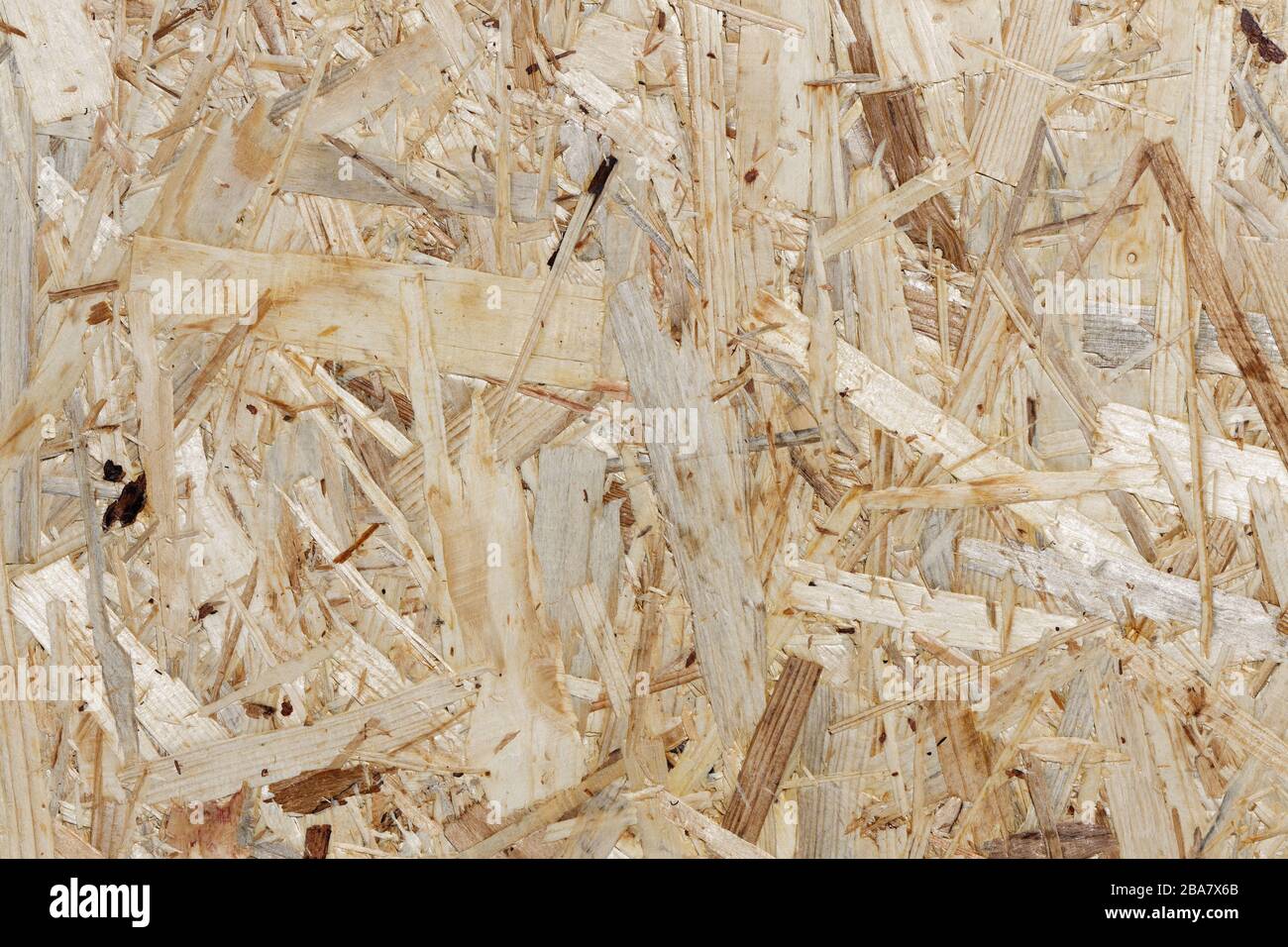Wood Background - OSB-Board Texture: section of an oriented strand board, made of different kinds of softwood strands Stock Photo