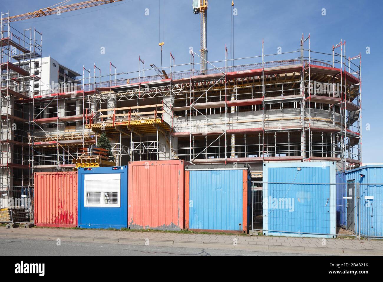 Residential building, scaffolding, construction site, structural work, construction container, Bremen, Germany, Europe Stock Photo