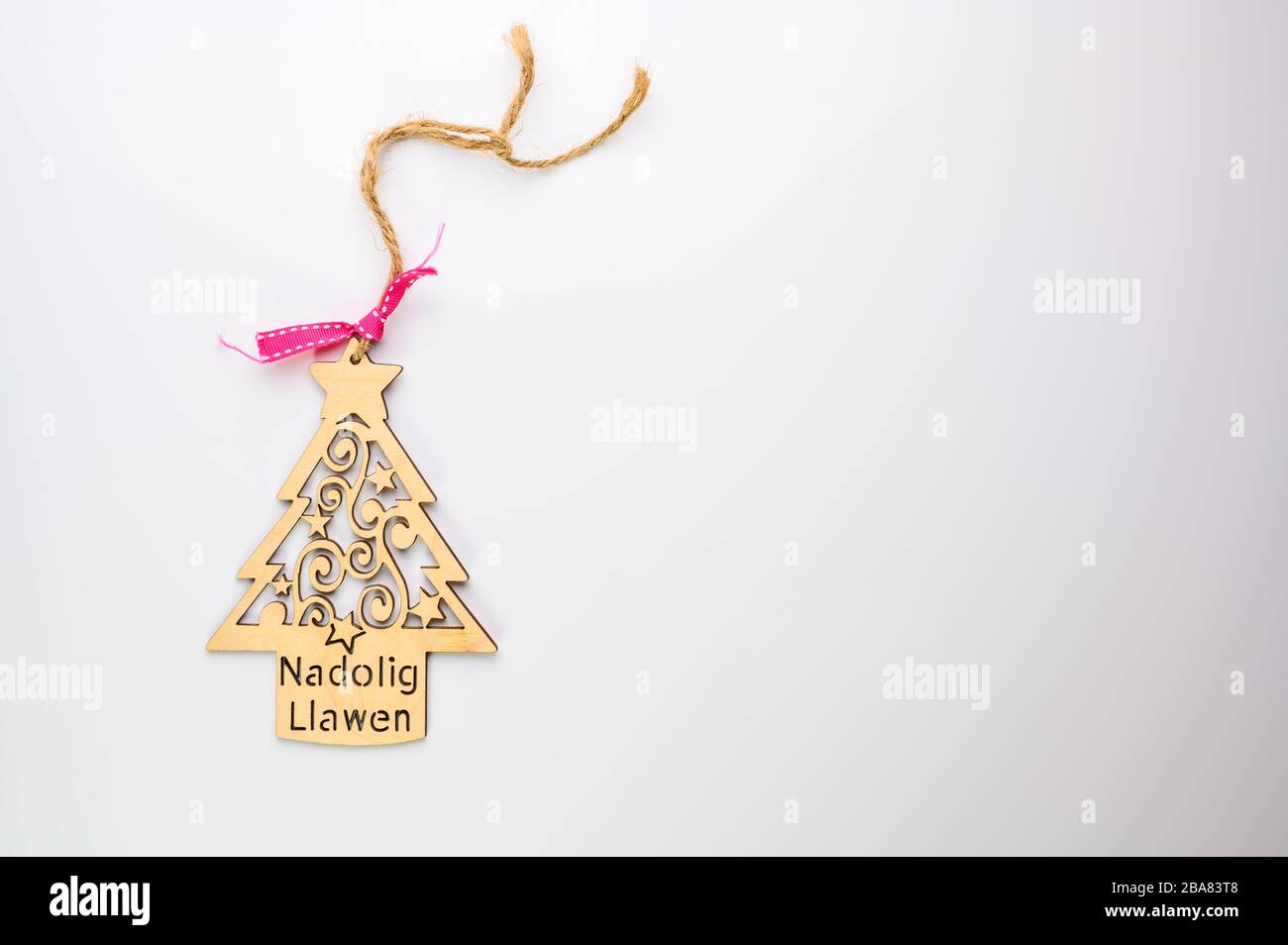 tradiitonal welsh christmas tree decoration with pink ribbon Stock