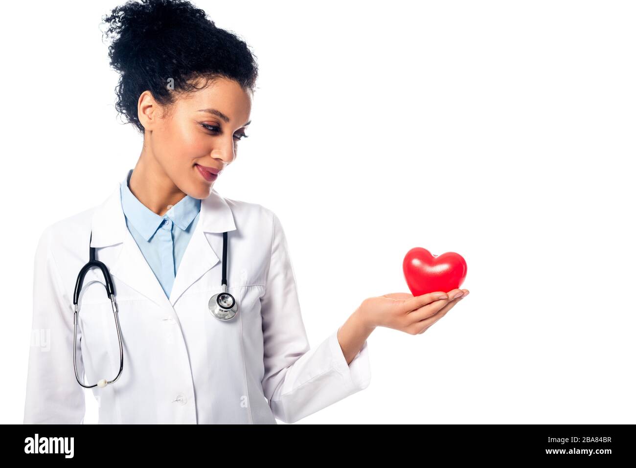 Front view of african american doctor showing decorative heart with ...