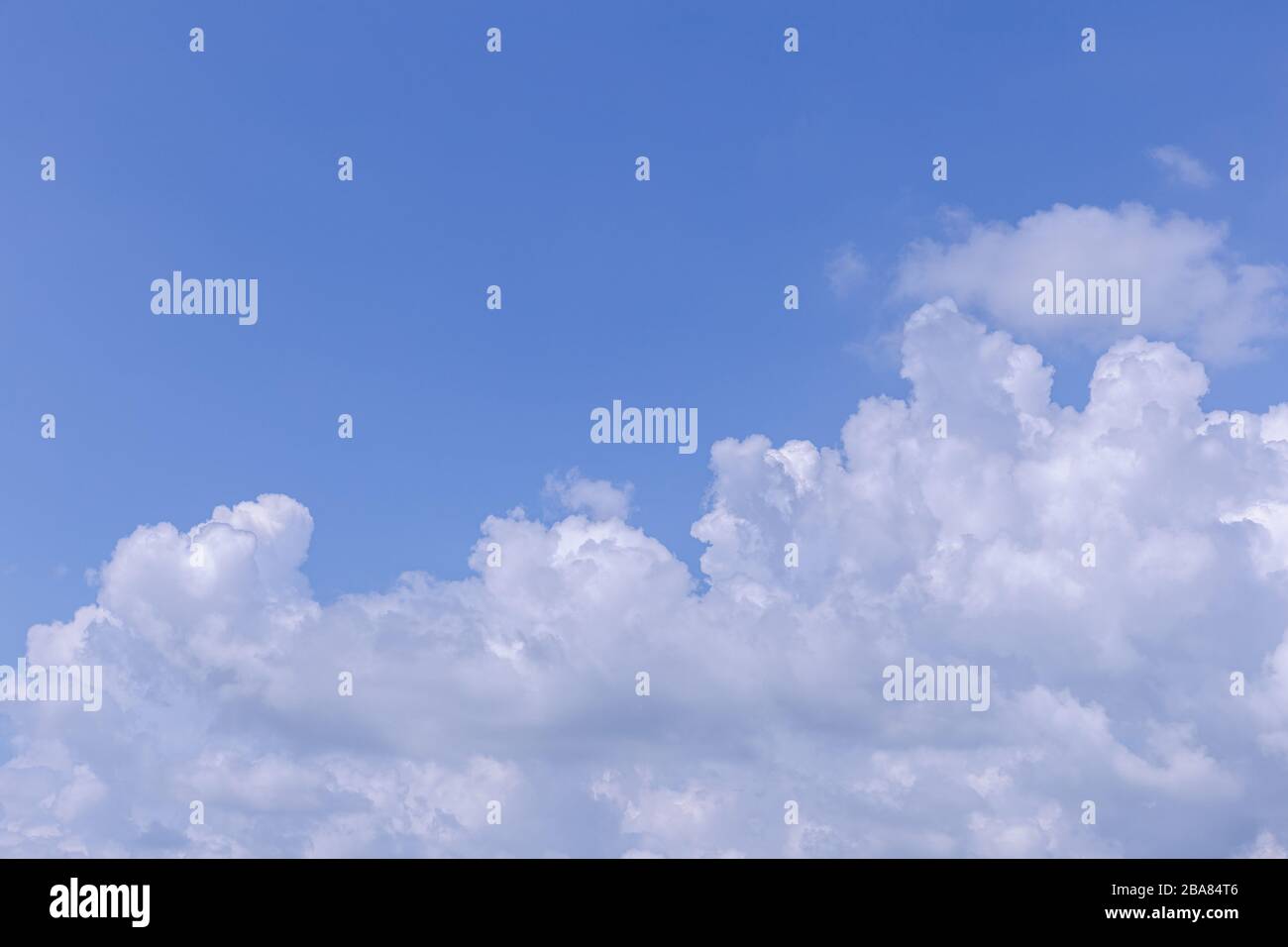 Blue sky background with white clouds on sunny day Stock Photo - Alamy