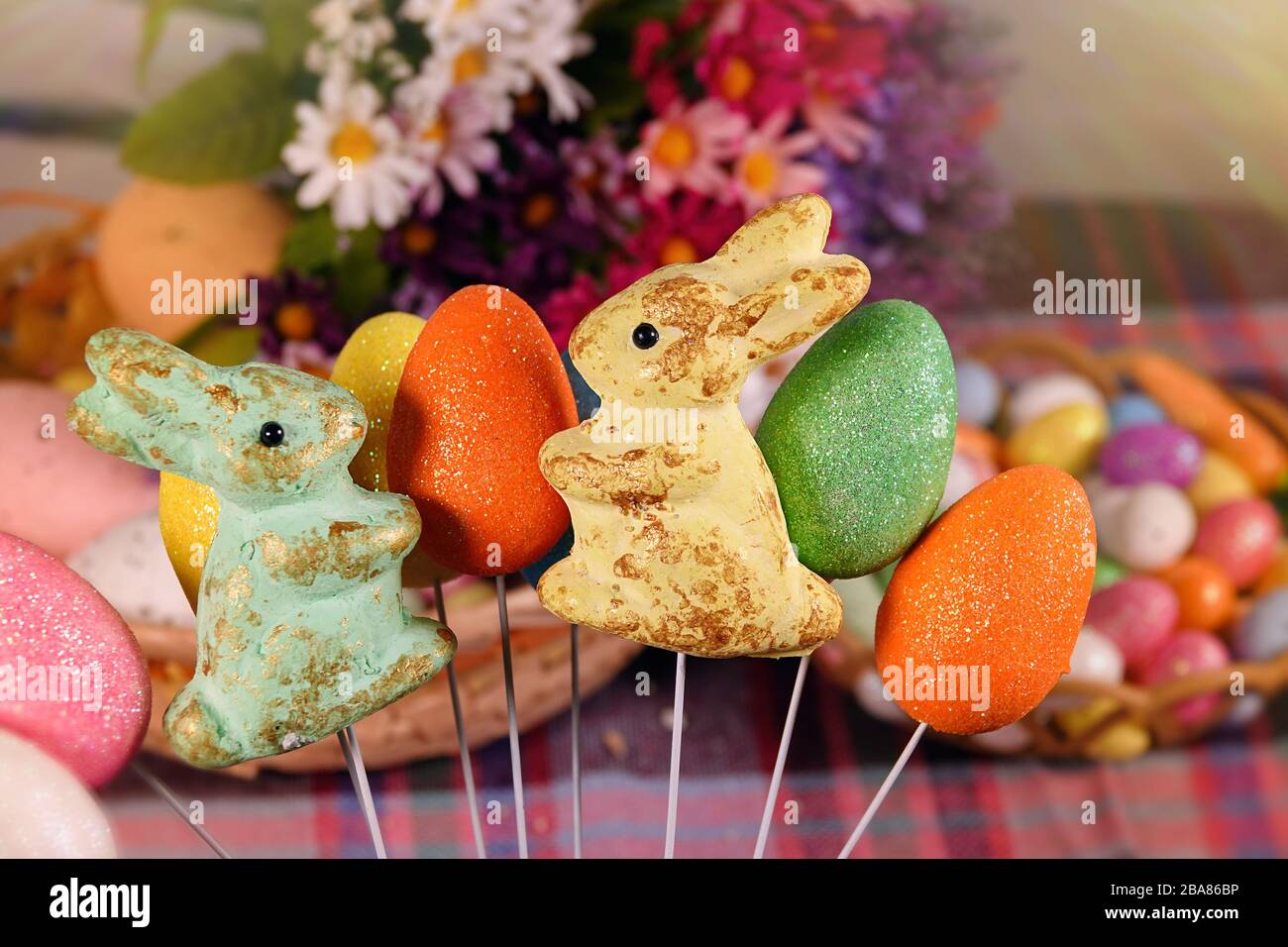 Rabbit Toy and Colorful Paschal Easter Eggs Stock Photo