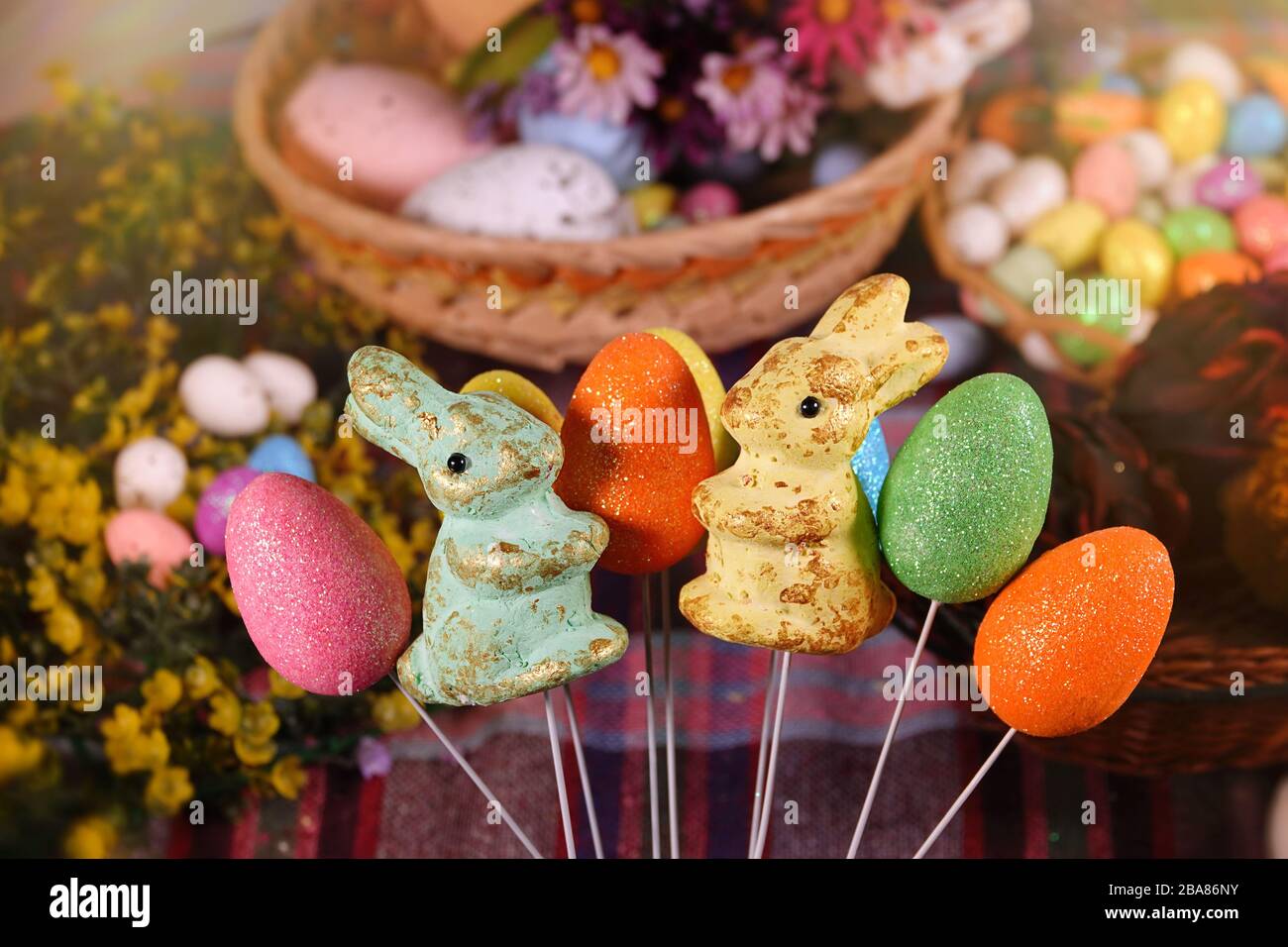 Rabbit Toy and Colorful Paschal Easter Eggs Stock Photo