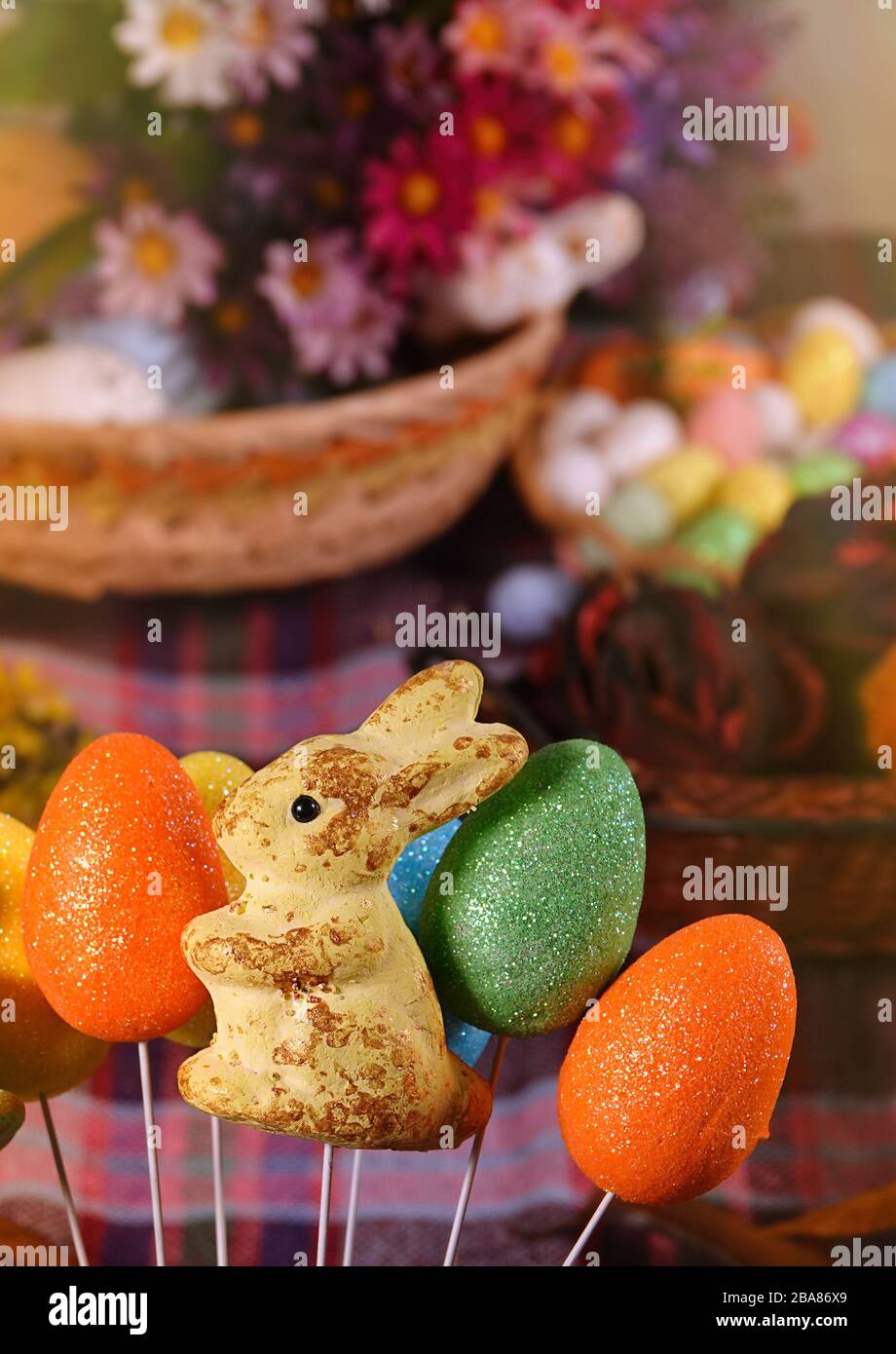 Rabbit Toy and Colorful Paschal Easter Eggs Stock Photo