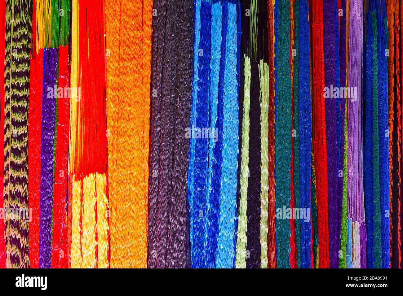 Multicolored and vibrant stripped fabrics pattern. Colorful background. Stock Photo